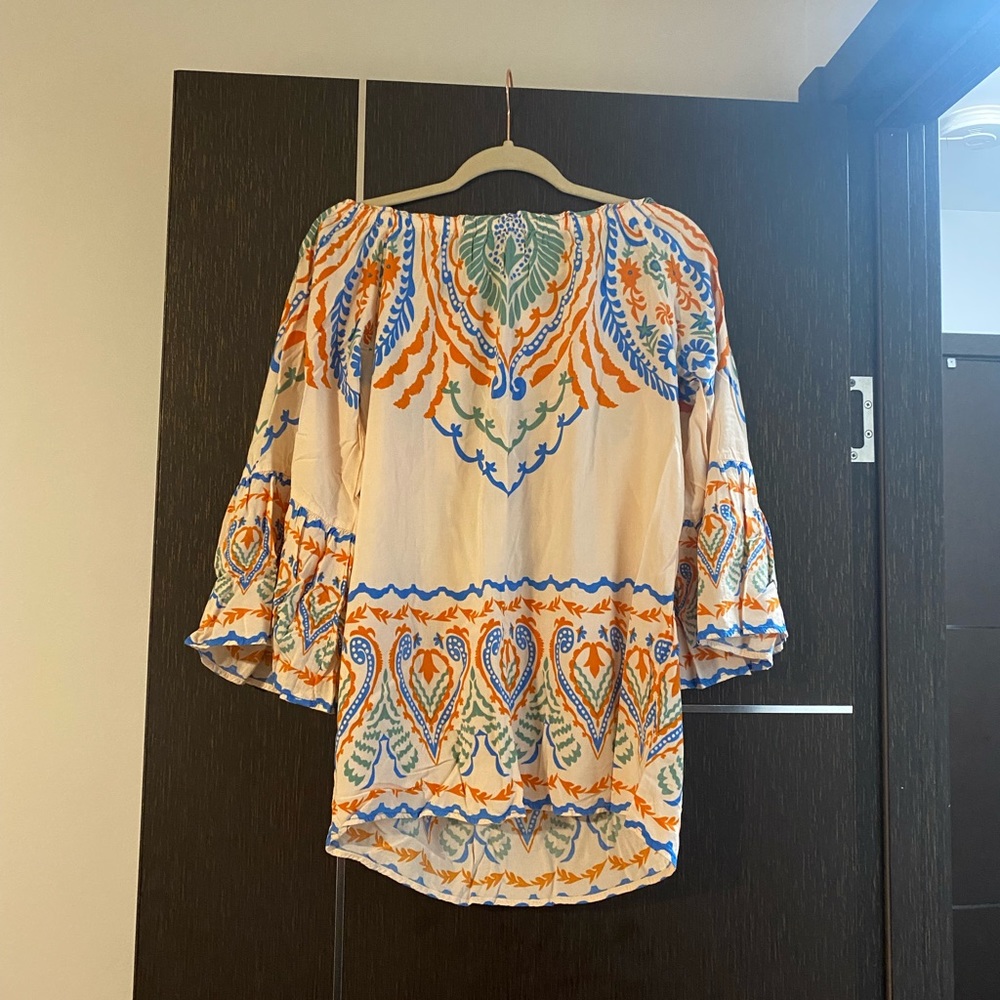 Flying tomato floral top